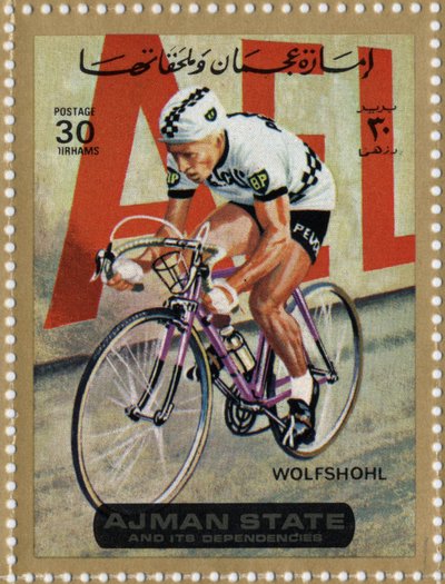 Timbre des Émirats représentant le cycliste Rolf Wolfshohl (né en 1938) - School Arabic