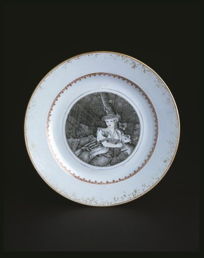 Assiette blanche bordée d