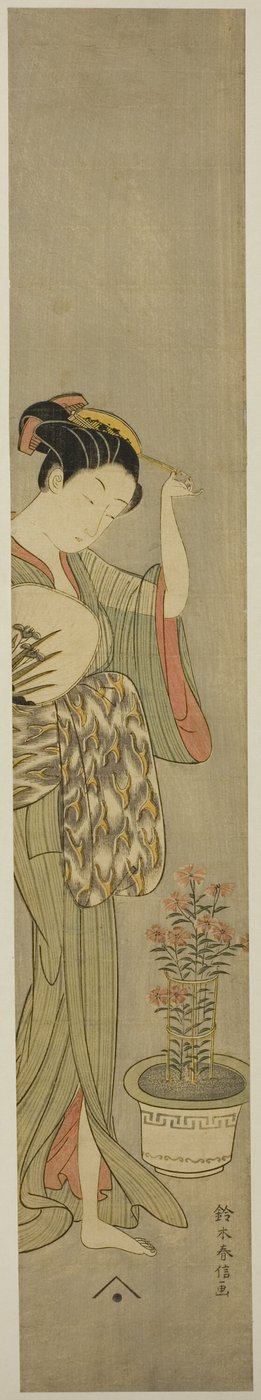 Beauté ajustant sa barrette - Suzuki Harunobu