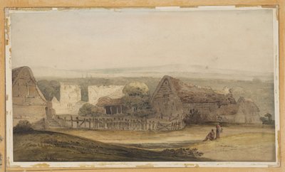 Un vaste bâtiment avec des dépendances agricoles et les ruines d