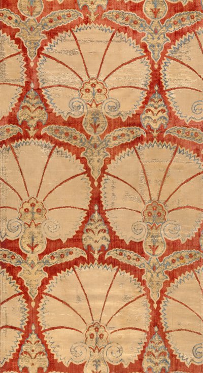 Panneau de velours rouge coupé avec des palmettes d