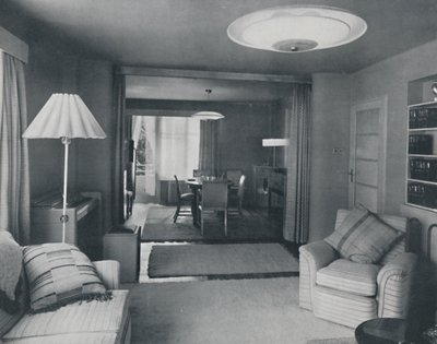 Salle à manger et salon, séparés uniquement par de lourds rideaux dans un tissage moderne attrayant - Unbekannt