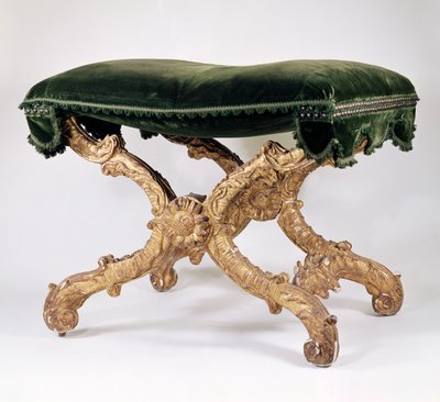 Tabouret en X de la Régence française (1700-1720), en bois doré avec siège rembourré, motif de feuilles et de flammes, tournesol à l