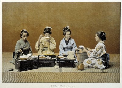 Une salle à manger au Japon : femmes mangeant du riz avec des baguettes et l