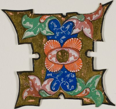 Initiale "I" décorée avec des feuilles d