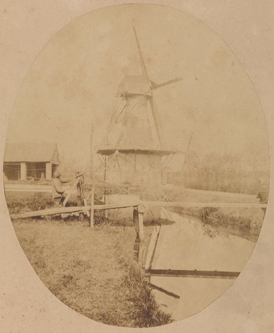 [Peintre en chapeau au chevalet peignant un moulin à vent] - Unknown artist