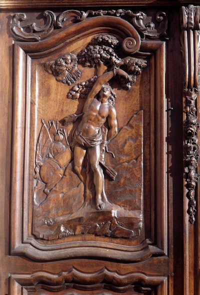 Le martyre de Saint Sébastien (détail) de la porte en bois sculptée de l