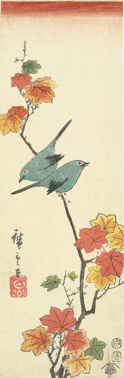 Mésanges japonaises sur une branche d