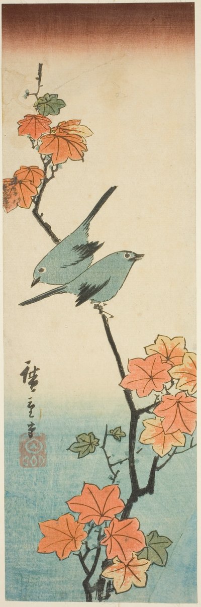 Mésanges japonaises sur une branche d