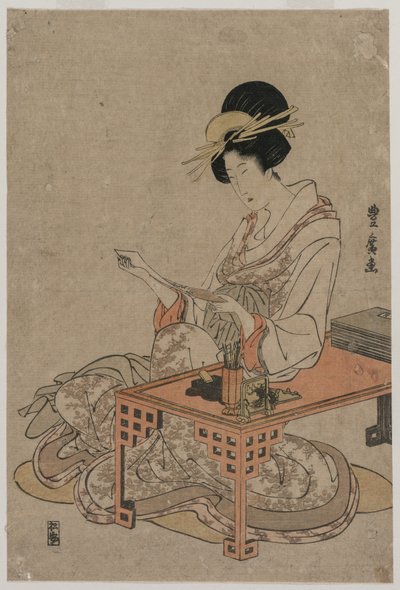 Courtisane assise à une table d