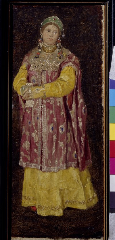 Jeune femme portant la robe et la coiffe traditionnelle de l