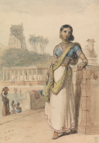 Une femme de haute caste debout près d