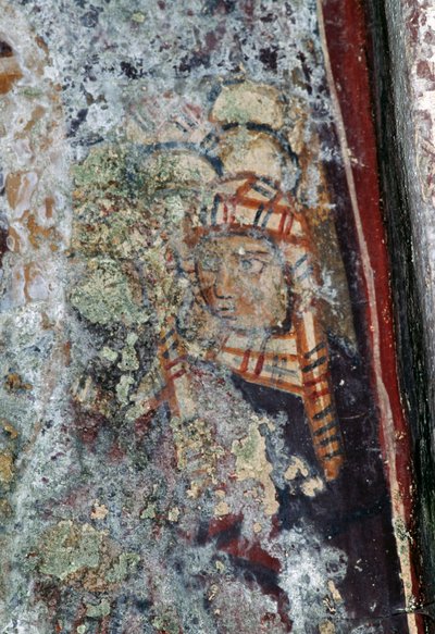 Figure masculine avec couvre-chef, fresque endommagée dans l