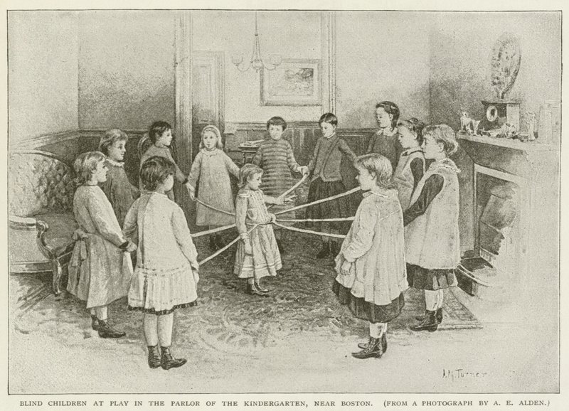 Enfants aveugles jouant dans le salon du jardin d