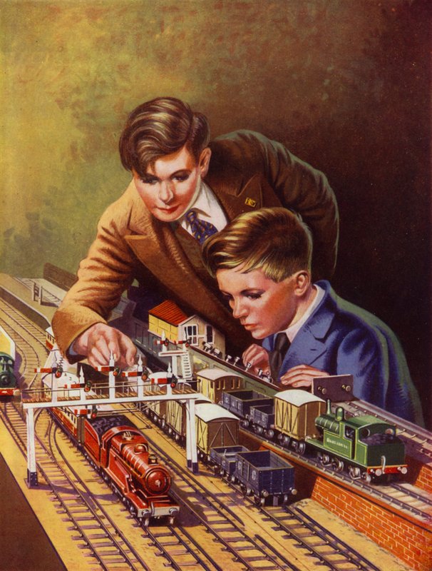 Garçons jouant avec un train miniature - English School