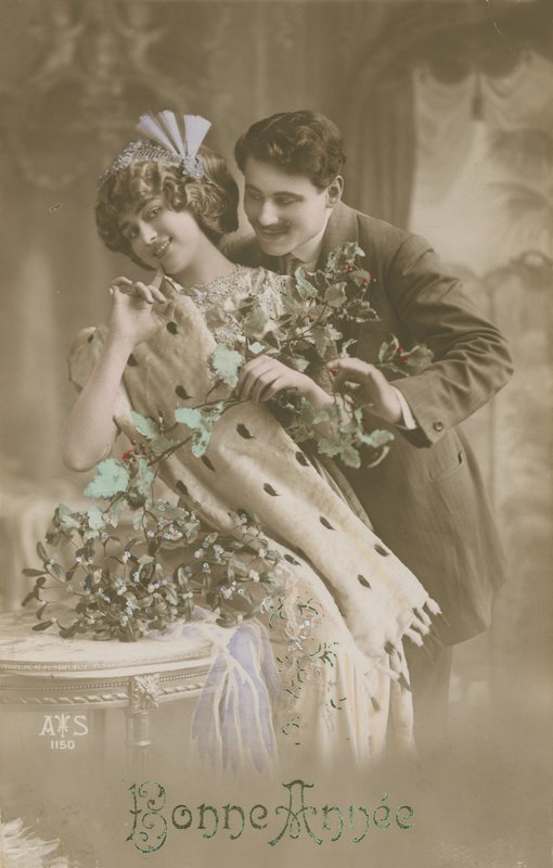 Carte de vœux de Bonne Année avec couple romantique tenant du gui - French Photographer