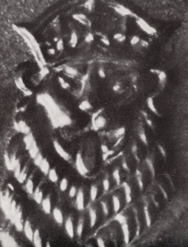 Tête de lion sur une pièce de un shilling - Paul Henning