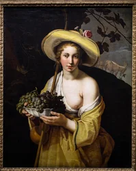 Bergère avec un plat de raisins