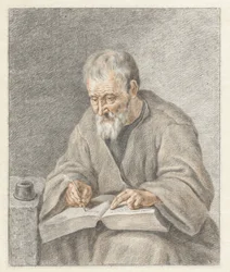 Vieil homme écrivant dans un livre