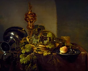 Nature morte avec un panier de raisins et une coupe en or