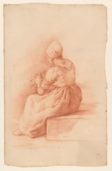 Femme assise avec un bonnet, vue de dos