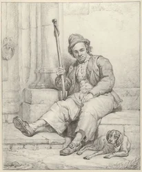 Homme assis avec un chien
