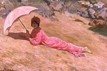Fille allongée sur la plage avec une ombrelle rose