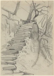 Un escalier en pierre dans un jardin