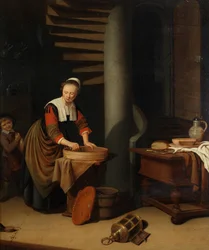 Une cuisinière qui repasse