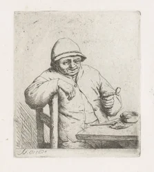 Homme avec une pipe à table