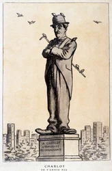 Charlot en statue avec inscription sur le socle : « À Charlot, l