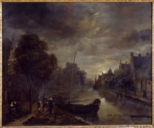 Un canal dans une ville hollandaise au clair de lune