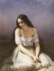 Jeune femme agenouillée