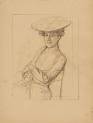 Femme assise avec un chapeau