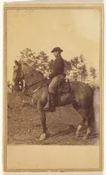 [Homme portant un chapeau, de profil, à cheval]