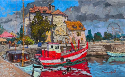 Un bateau de pêche coloré dans le port
