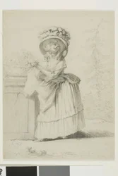 Une jeune femme élégante dans un jardin