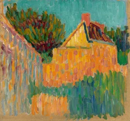 Petite maison devant des buissons