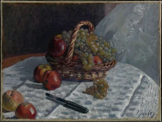 Pommes et raisins dans un panier