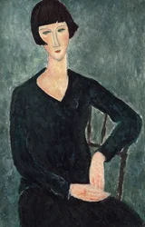 Femme assise à la robe bleue