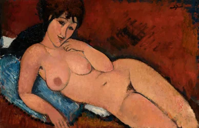 Nu sur un coussin bleu