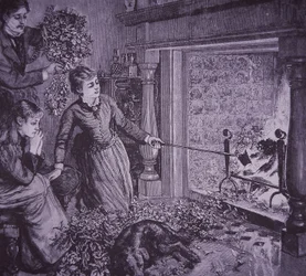 Une famille brûle des branches de Noël et fait des toasts