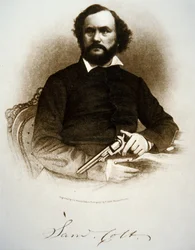 Samuel Colt tenant un de ses revolvers à percussion