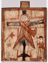 Figure en uniforme sur la croix