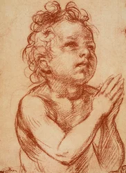Jeune garçon priant