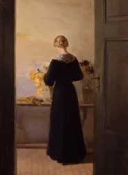 Fille arrangeant des fleurs
