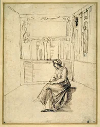 Une femme assise dans une pièce