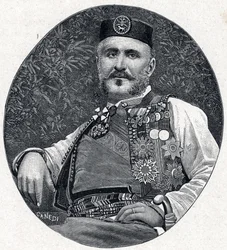 Portrait de Nicolas Ier de Monténégro (Nikola I Petrović-Njegoš) (Petrović-Njegoš) (1841-1921), prince de Monténégro et des Brda. Gravure dans « Les Missions Catholiques au XIXe Siecle » de Louis-Eugène (Louis Eugène) Louvet. Collection particulière.