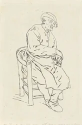 Homme assis dans un fauteuil