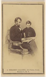 Le président Lincoln lisant la Bible à son fils Tad